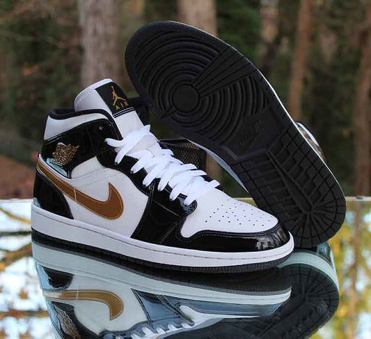 The Air Jordan 1 Mid SE "Black/Gold Patent